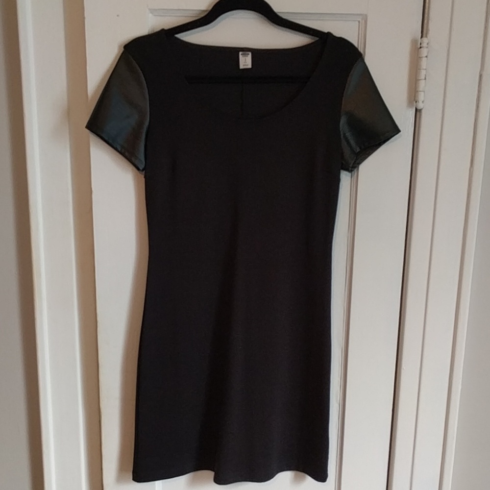 Black ponte-knit dress with faux leather sleeves